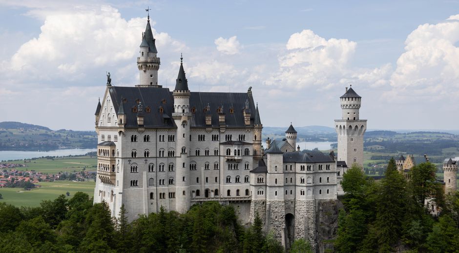Neuschwanstein Castle, a romantic 19th-century palace, nestled in Bavaria's picturesque foothills.